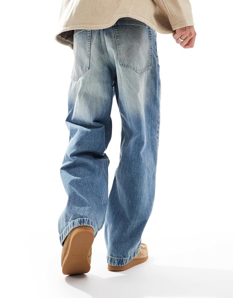 Bershka super baggy fit jeans in washed blue