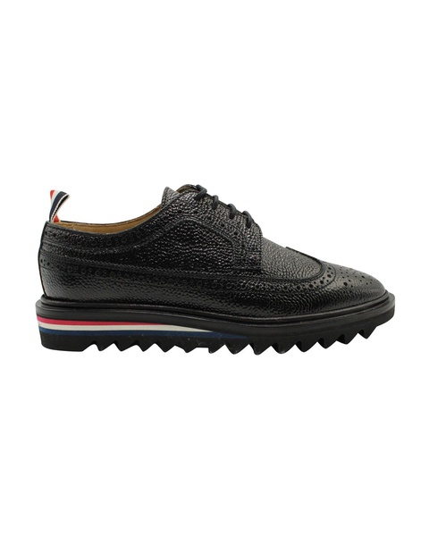 classic longwing threaded sole brogues in black pebble grain leather