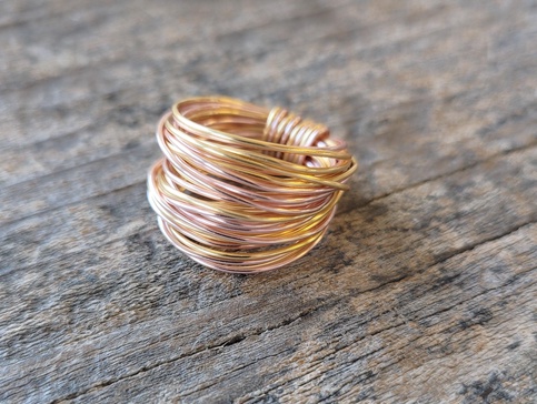 marcia wire wrap ring in rose gold with gold