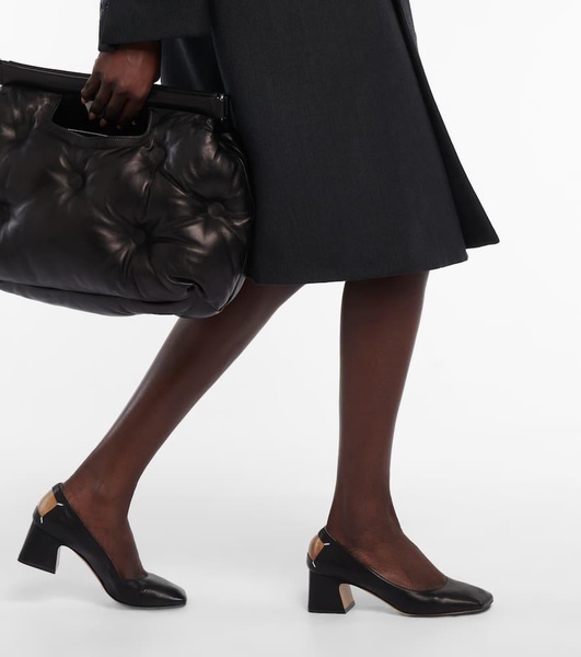 Four Stitch leather court pumps