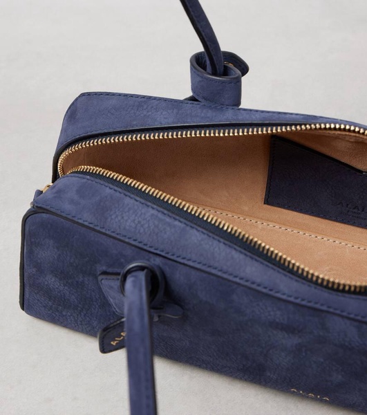 Le Teckel suede shoulder bag