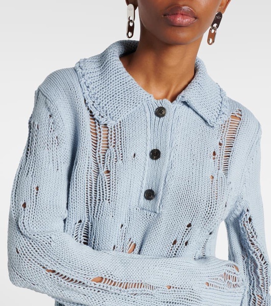 Distressed cotton and wool sweater