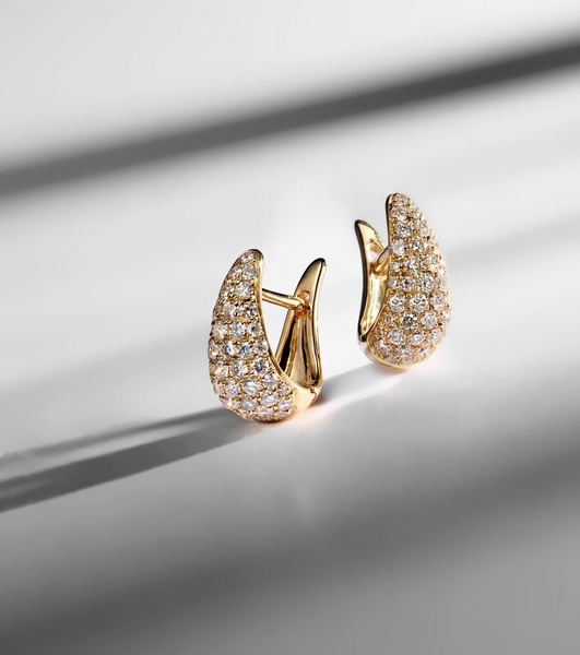 Claw 18kt gold earrings with diamonds