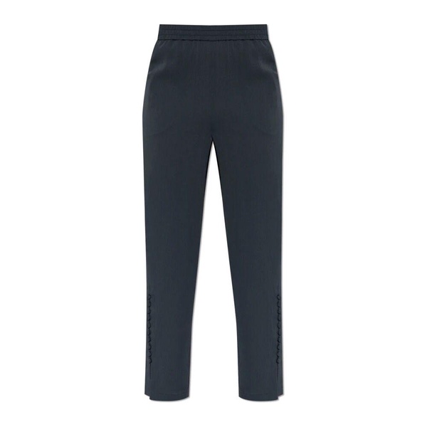 Crépon trousers with button detail at the hem