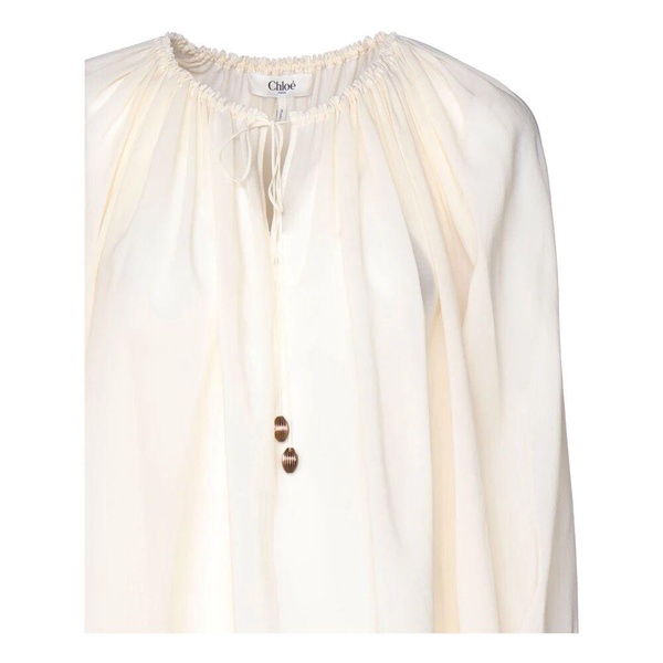 White Cotton Blouse with Ruffles