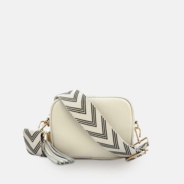 stone leather crossbody bag with olive green arrow strap