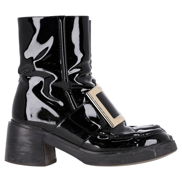 metal buckle boots in black patent leather