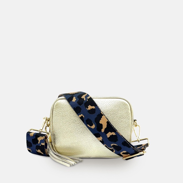 gold leather crossbody bag with navy leopard strap