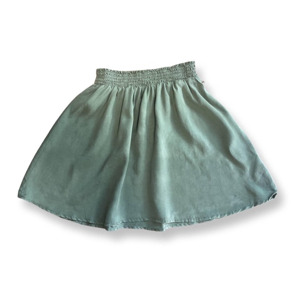 girl smocked skirt in basil