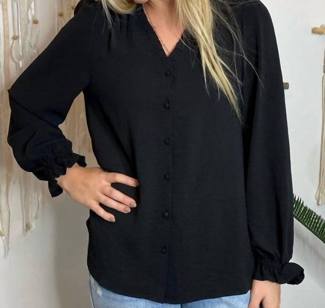 button up blouse with ruffle accents in black