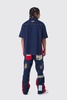 Relaxed Flare Rigid Gusset Applique Badge Jeans