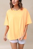 oversized raw edge top in neon coral