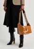 Glossed leather camera bag