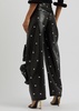 Stud-embellished faux leather trousers