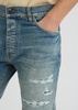 Quad Repaired distressed skinny jeans 