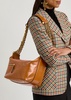 Glossed leather camera bag