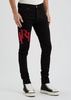 Staggered logo skinny jeans 