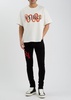 Staggered logo skinny jeans 