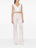 Embroidered and cut-out design trousers in cotton