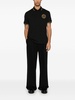 Black cotton polo shirt with embroidered logo