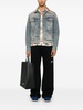 Jacket in denim with pockets