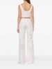Embroidered and cut-out design trousers in cotton