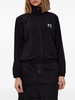 Jacket with hood hidden in collar