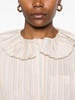 Striped shirt with ruffles