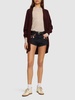 Inner Energy embellished denim shorts