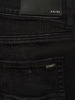 Amiri logo distressed jeans