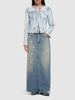 Coated denim collarless jacket
