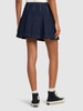 Pleated cotton denim mini skirt