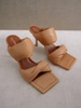 twist strap leather mules in camel