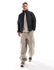 Jack & Jones packable padded jacket with standing collar in black