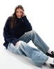 ASOS DESIGN crew neck oversized boucle sweater in navy