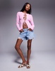 ASOS DESIGN knit tie front cardigan with red tipping detail in pink