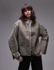 ARKET oversized denim shacket with high collar and front patch pockets in washed khaki green