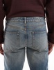 ASOS DESIGN stretch flare jeans in light wash blue with tint
