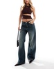 Bershka Petite baggy wide leg jeans in mid wash blue
