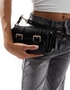 ASOS DESIGN shoulder bag with pockets and hardware detail in black