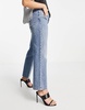 ASOS DESIGN Petite cotton blend low rise straight leg jeans in all over diamante hotfix with ripped knee - MBLUE