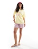 Pieces oversized t-shirt with fresh squeeze graphic in yellow