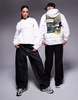 ASOS DESIGN Disney unisex oversized hoodie with Mickey print in off-white