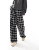 Bershka Petite tie waist wide leg pants in black check
