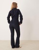 ASOS DESIGN denim long sleeve jumpsuit in indigo
