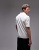 ARKET textured jersey short sleeve polo shirt in white