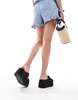 ASOS DESIGN Take Over buckle detail flatform mules in black