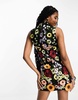 Amy Lynn Cleo high neck sleeveless mini dress in black based floral embroidery