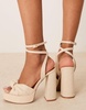 ASOS DESIGN Nikita knotted platform heeled sandals in natural fabrication