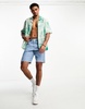 Bershka placement printed shirt in white and green